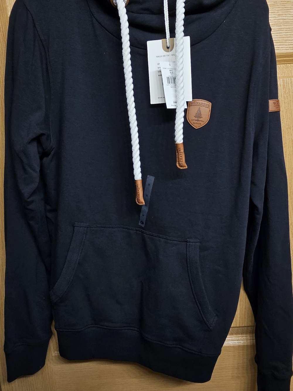 Wanakome Black Hoodie with Tan Leather Tree Patch